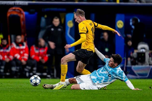 Borussia Dortmund forwarder Maximilian Beier, Bodo Glimt midfielder Fredrik Sjovold, during the match Borussia Dortmund vs FK Bodo Glimt at the BVB Stadion Dortmund for the Champions League - League phase - Matchday 6 season 2025-2026 in DORTMUND, Germany on 10 December 2025, (photo by Stefan Koops EYE4images DeFodi Images)