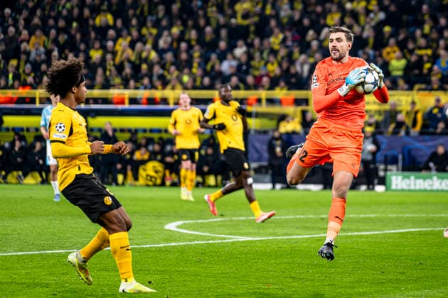 Borussia Dortmund forwarder Karim Adeyemi, Bodo Glimt goalkeeper Nikita Haikin, during the match Borussia Dortmund vs FK Bodo Glimt at the BVB Stadion Dortmund for the Champions League - League phase - Matchday 6 season 2025-2026 in DORTMUND, Germany on 10 December 2025, (photo by Stefan Koops EYE4images DeFodi Images)