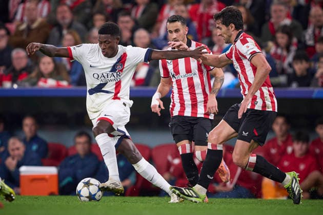 ATHLETIC DE BILBAO v PARIS SAINT-GERMAIN. CHAMPIONS LEAGUE 2025 2026. ROUND 6. Athletic de Bilbao s Dani Vivian (R) and Paris Saint-Germain s Nuno Mendes during Champions League 2025 2026 match. December 10,2025. (ALTERPHOTOS Ropero) BilbaoSpain  Copyright: xRoperox