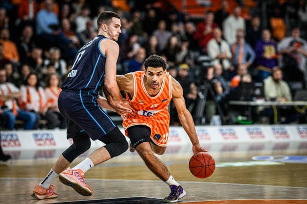 Marko Simonovic (Turk Telekom Ankara) und Mark Smith (ratiopharm ulm) battle for the ball during the Basketball Eurocup match between ratiopharm ulm and Turk Telekom Ankara at ratiopharm Arena on December 10, 2025 in Neu-Ulm, Germany. (Photo by Harry Langer DeFodi Images)