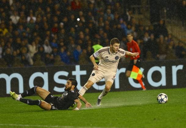 Qarabag FK v Ajax - UEFA Champions League BAKU, AZERBAIJAN - DECEMBER 10: Qarabag FK’s Elvin Jafarguliyev (L) competes against Ajax’s Anton Gaaei (R) during the UEFA Champions League group stage MD6 match between Qarabag FK and AFC Ajax at Tofiq Bahramov Stadium in Baku, Azerbaijan, on December 10, 2025. Resul Rehimov Anadolu Baku Azerbaijan. Editorial use only. Please get in touch for any other usage.  Copyright: x2025xAnadoluxResulxRehimovx