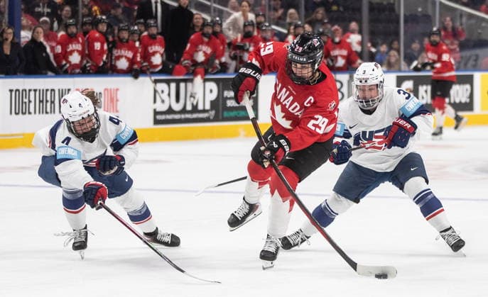 December 10, 2025, Edmonton, Ab, CANADA: United States Caroline Harvey (4) and Cayla Barnes (3) chase Canada s Marie-Philip Poulin (29) during first period Rivalry Series action in Edmonton on Wednesday, December 10, 2025. Canada News - December 10, 2025  - ZUMAc35_ 20251210_zaf_c35_089 Copyright: xJasonxFransonx