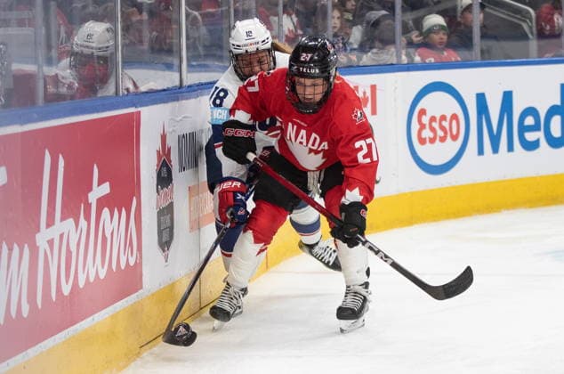 December 10, 2025, Edmonton, Ab, CANADA: United States Jesse Compher (18) and Canada s Emma Maltais (27) battle for the puck during second period Rivalry Series action in Edmonton on Wednesday, December 10, 2025. Canada News - December 10, 2025  - ZUMAc35_ 20251210_zaf_c35_104 Copyright: xJasonxFransonx