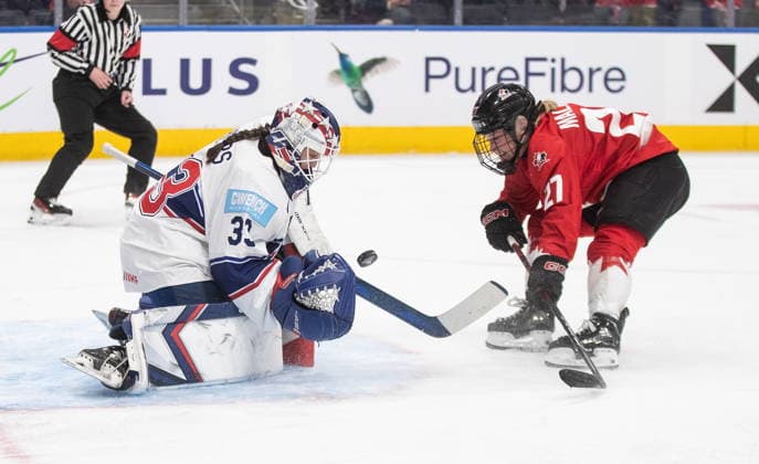 December 10, 2025, Edmonton, Ab, CANADA: United States goaltender Gwyneth Philips (33) stops Canada s Emma Maltais (27) during third period Rivalry Series action in Edmonton on Wednesday, December 10, 2025. Canada News - December 10, 2025  - ZUMAc35_ 20251210_zaf_c35_114 Copyright: xJasonxFransonx