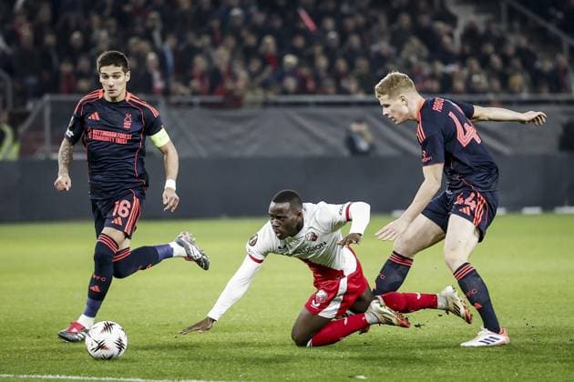 UTRECHT - (l-r) Souffian El Karouani of FC Utrecht, Morgan Gibbs-White of Nottingham Forest, and Mike Eerdhuijzen of FC Utrecht during the UEFA Europa League match between FC Utrecht and Nottingham Forest at Galgenwaard Stadium on December 11, 2025, in Utrecht, Netherlands. ANP ROBIN VAN LONKHUIJSEN UEFA Europa League matchday 6 2025-2026 xVIxANPxSportx xxANPxIVx 544594659 originalFilename: 544594659.jpg