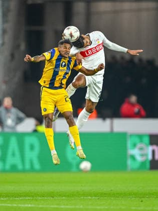 Helio Varela (Maccabi Tel-Aviv FC) und Lorenz Assignon (VfB Stuttgart) battle for the ball during the UEFA Europa League 2025 26 League Phase MD6 match between VfB Stuttgart and Maccabi Tel-Aviv FC at Stuttgart Arena on December 11, 2025 in Stuttgart, Germany. (Photo by Harry Langer DeFodi Images)