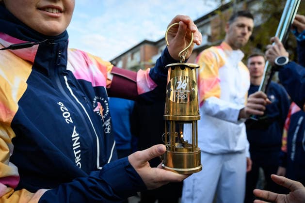 December 11, 2025, Pontedera, Rome, Italy: The Olympic Torch passes through Pontedera, the city of motors for the Milan Cortina 2026 Winter Olympics . Pontedera, Italy 11 December 2025 The Milan Cortina 2026 Olympic Torch.  - ZUMAa289 20251211_zia_a289_091 Copyright: xStefanoxDallexLuchex