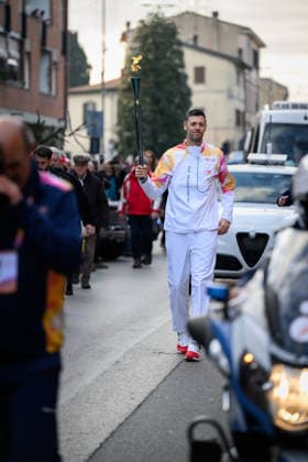December 11, 2025, Pontedera, Rome, Italy: The Olympic Torch passes through Pontedera, the city of motors for the Milan Cortina 2026 Winter Olympics . Pontedera, Italy 11 December 2025 The Milan Cortina 2026 Olympic Torch.  - ZUMAa289 20251211_zia_a289_096 Copyright: xStefanoxDallexLuchex