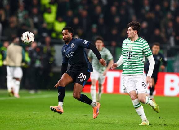 Danilo of Rangers in action with Bence Otvos of Ferencvaros during UEFA Europa League league phase match at the Groupama Arena, Budapest. Ferencvaros v Rangers - UEFA Europa League - League Phase - Groupama Arena, Budapest, Hungary - 11 Dec 2025Budapest Groupama Arena United Kingdom  Copyright: xO Rourke RangersxFC Shutterstockx 16081545bk