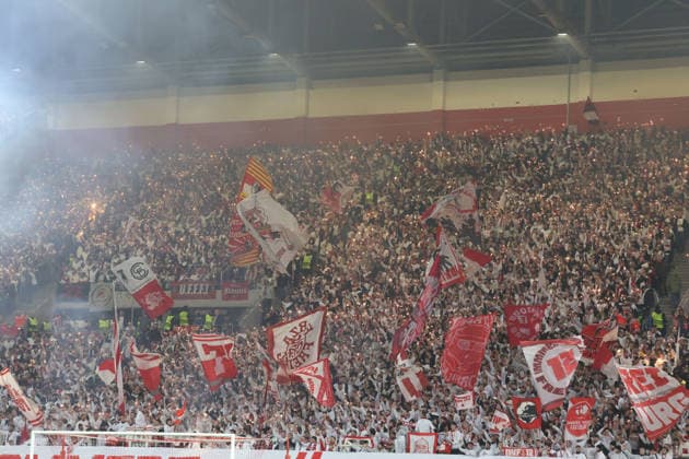 11.12.2025, xrekx, Fussball UEFA Europa League, SC Freiburg - RB Salzburg v.l. SC Freiburg Fans ,Stimmung, Schals, Trikot, Fahne, Banner, Ultras, Zuschauer, Besucher, Choreo, Choreografie, atmosphere, spectators, Visitors (DFL DFB REGULATIONS PROHIBIT ANY USE OF PHOTOGRAPHS as IMAGE SEQUENCES and or QUASI-VIDEO) Freiburg