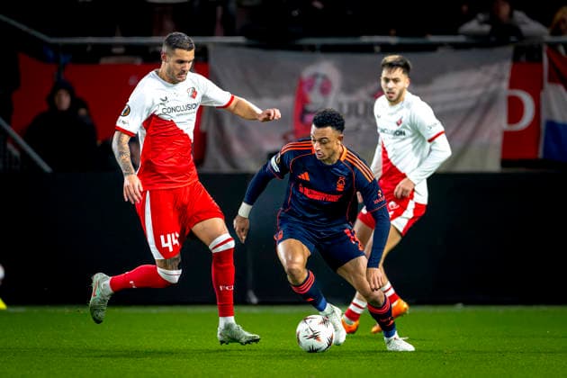 Nottingham Forest FC forwarder Arnaud Kalimuendo, FC Utrecht defender Mike Eerdhuijzen during the match FC Utrecht vs Nottingham Forest FC at the Stadium de Galgenwaard for the Europa League - League phase - Matchday 6 season 2025-2026 in UTRECHT, Netherlands on 11 december 2025, (photo by Marcel van Dorst EYE4images DeFodi Images)