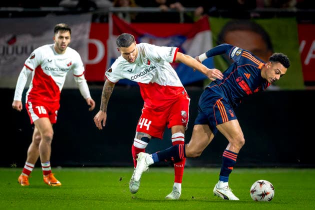 Nottingham Forest FC forwarder Arnaud Kalimuendo, FC Utrecht defender Mike Eerdhuijzen during the match FC Utrecht vs Nottingham Forest FC at the Stadium de Galgenwaard for the Europa League - League phase - Matchday 6 season 2025-2026 in UTRECHT, Netherlands on 11 december 2025, (photo by Marcel van Dorst EYE4images DeFodi Images)