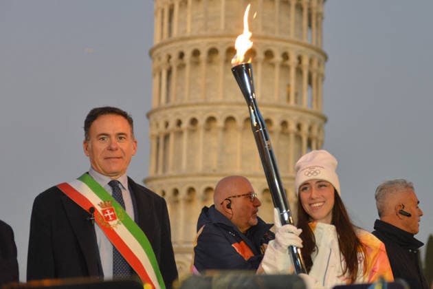 Arrival Of Olympic Flame in the Piazza dei Miracoli - Pisa Arrival of the Olympic Torch in the Piazza dei Miracoli in Pisa, Italy on December 12, 2025. Photo by Roberto Cappello IPA ABACAPRESS.COM Pisa Italy Italy  Copyright: xIPA ABACAx