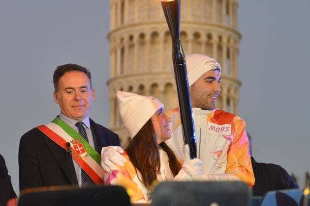 Arrival Of Olympic Flame in the Piazza dei Miracoli - Pisa Arrival of the Olympic Torch and fencing champion Filippo Macchi during the arrival of the Olympic Flame in the Piazza dei Miracoli in Pisa, Italy on December 12, 2025. Photo by Roberto Cappello IPA ABACAPRESS.COM Pisa Italy Italy  Copyright: xIPA ABACAx