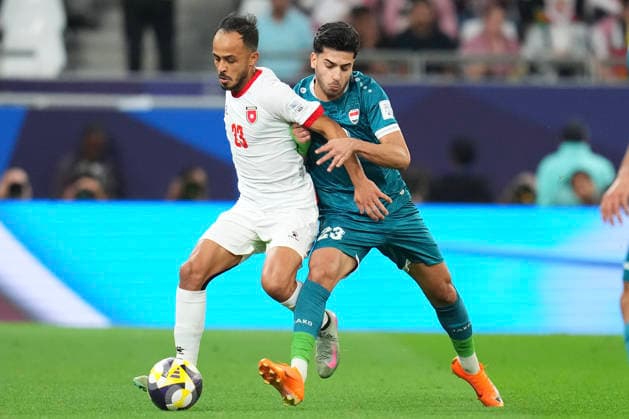 2025 FIFA Arab Cup in Doha, Qatar Adham Alquraishi of Jordan (L) vies for the ball with Ahmed Hasan of Iraq (R) during the Quarterfinal football match between Jordan and Iraq in the 2025 FIFA Arab Cup at the Education City Stadium in Doha, Qatar on December 12, 2025. Doha Qatar  Copyright: xMatrixxImagesx xNicxBothmax