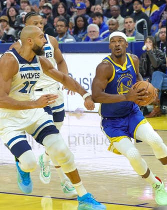 (251213) -- SAN FRANCISCO, Dec. 13, 2025 -- Jimmy Butler (R) of Golden State Warriors vies with Rudy Gobert (L) of Minnesota Timberwolves during the 2025-2026 NBA, Basketball Herren, USA regular season match between Golden State Warriors and Minnesota Timberwolves in San Francisco, the United States, on Dec. 12, 2025. (Photo by Xinhua) *(SP)U.S.-SAN FRANCISCO-BASKETBALL-NBA-WARRIORS VS TIMBERWOLVES DongxXudong 