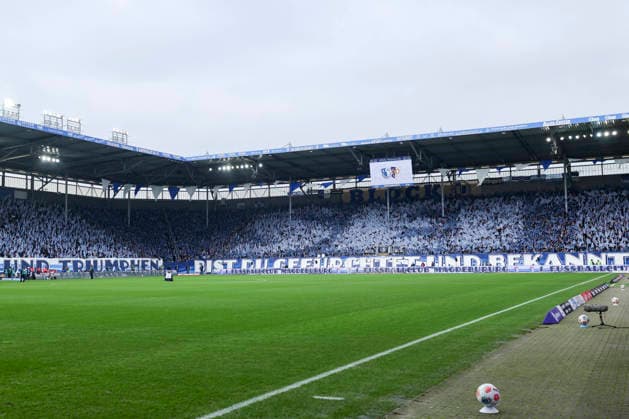 Die Fans des 1. FC Magdeburg zeigen anlaesslich des 60-jaehrigen Jubilaeums eine Choreographie, 2. Bundesliga, 1. FC Magdeburg v Holstein Kiel, Avnet Arena am 13. December 2025 in Magdeburg, Deutschland. (Foto von Marco Steinbrenner DeFodi Images) Fans of 1. FC Magdeburg perform a choreographed display to mark the club s 60th anniversary, 2. Bundesliga, 1. FC Magdeburg v Holstein Kiel, Avnet Arena, December 13, 2025 in Magdeburg, Germany. (Photo by Marco Steinbrenner DeFodi Images) *** Fans of 1 FC Magdeburg perform a choreographed display to mark the club s 60th anniversary, 2 Bundesliga, 1 FC Magdeburg v Holstein Kiel, Avnet Arena on December 13, 2025 in Magdeburg, Germany Photo by Marco Steinbrenner DeFodi Images Fans of 1 FC Magdeburg perform a choreographed display to mark the club s 60th anniversary, 2 Bundesliga, 1 FC Magdeburg v Holstein Kiel, Avnet Arena, December 13, 2025 in Magdeburg, Germany Photo by Marco Steinbrenner DeFodi Images