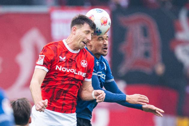 13.12.2025 - Fußball, 2025 2026, 2. Bundesliga, 16. Spieltag, DSC Arminia Bielefeld - 1. FC Kaiserslautern: (L-R) Daniel Hanslik (Kaiserslautern), Joel Felix (Bielefeld) DFL REGULATIONS PROHIBIT ANY USE OF PHOTOGRAPHS AS IMAGE SEQUENCES AND OR QUASI-VIDEO.