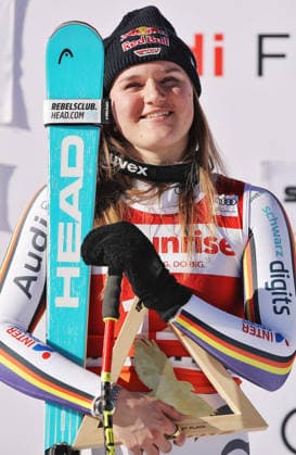 ALPINE SKIING - FIS WC St. Moritz SANKT MORITZ,SWITZERLAND,13.DEC.25 - ALPINE SKIING - FIS World Cup, downhill, ladies. Image shows Emma Aicher (GER). Keywords: award ceremony, trophy.  GEPAxpictures xMatthiasxHauer