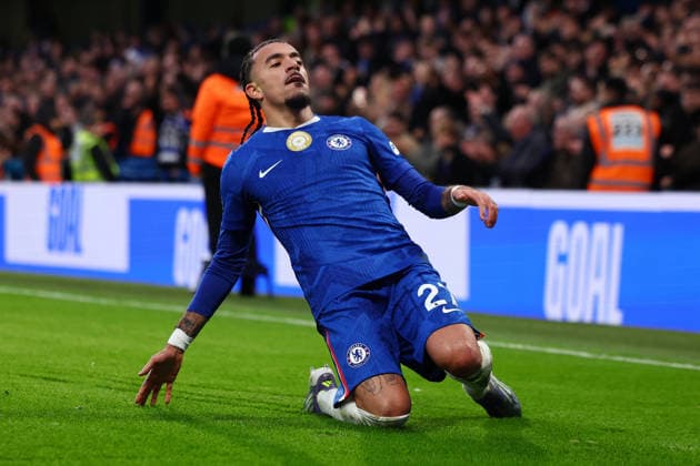 London, England, 13th December 2025. Malo Gusto of Chelsea celebrates after scoring to make it 2-0 during the Chelsea vs Everton Premier League match at Stamford Bridge, London. Picture credit should read: Paul Terry Sportimage EDITORIAL USE ONLY. No use with unauthorised audio, video, data, fixture lists, club league logos or live services. Online in-match use limited to 120 images, no video emulation. No use in betting, games or single club league player publications. SPI_032_PT_Chelsea_Everton SPI-4373-0032