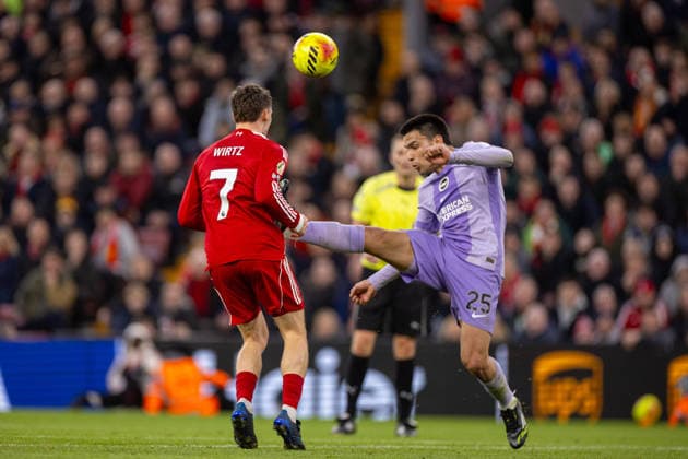 Football - FA Premier League - Liverpool FC v Brighton & Hove Albion FC LIVERPOOL, ENGLAND - Saturday, December 13, 2025: Liverpool s Florian Wirtz is challenged by Brighton & Hove Albion s Diego Gomez (R) during the FA Premier League match between Liverpool FC and Brighton & Hove Albion FC at Anfield. (Photo by David Rawcliffe Propaganda) LIVERPOOL Anfield MERSEYSIDE ENGLAND  Copyright: xDavidxRawcliffex P2025-12-13-Liverpool_Brighton-66