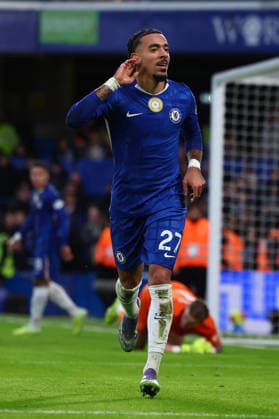 London, England, 13th December 2025. Malo Gusto of Chelsea celebrates after scoring to make it 2-0 during the Chelsea vs Everton Premier League match at Stamford Bridge, London. Picture credit should read: Paul Terry Sportimage EDITORIAL USE ONLY. No use with unauthorised audio, video, data, fixture lists, club league logos or live services. Online in-match use limited to 120 images, no video emulation. No use in betting, games or single club league player publications. SPI_034_PT_Chelsea_Everton SPI-4373-0034