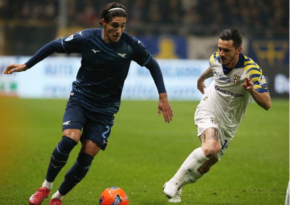 Lazio™s Matteo Cancellieri fight for the ball with Parma™s Emanuele Valeri during the Serie A soccer match between Parma and Lazio at the Ennio Tardini in Parma - Saturday , December 13, 2025. - Soccer .  Copyright: xGiannixSantandrea LaPressex