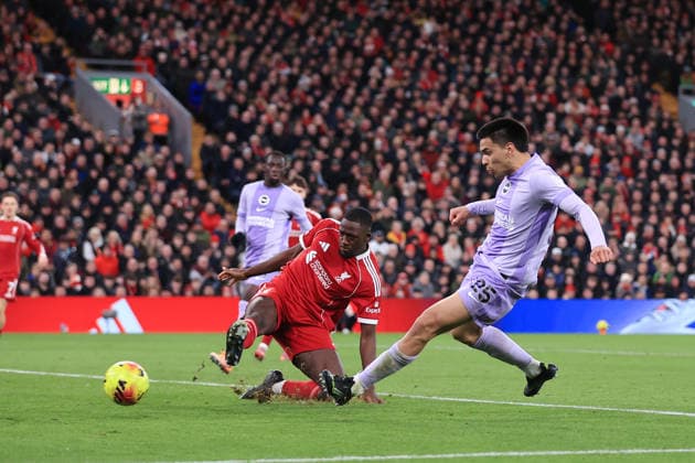 Football - Premier League - Liverpool v Brighton & Hove Albion 13th December 2025 - Premier League - Liverpool v Brighton & Hove Albion - Diego Gomez of Brighton & Hove Albion shoots under pressure from Ibrahima Konate of Liverpool - Photo: Simon Stacpoole Offside. Liverpool UK Copyright: xSimonxStacpoolexOffside