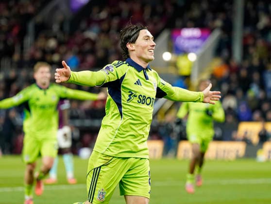Burnley, England, 13th December 2025. Harry Wilson of Fulham celebrates scoring their third goal during the Burnley vs Fulham Premier League match at Turf Moor, Burnley. Picture credit should read: Andrew Yates Sportimage EDITORIAL USE ONLY. No use with unauthorised audio, video, data, fixture lists, club league logos or live services. Online in-match use limited to 120 images, no video emulation. No use in betting, games or single club league player publications. SPI_047_AY_Burnley_Fulham SPI-4374-0047