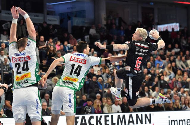 13.12.2025 - Handball - 1. Bundesliga DAIKIN HBL - Saison 2024 2025 - 17. Spieltag: HC Erlangen Metropolregion Nürnberg HCE - SC DHfK Leipzig - OGo - xOGox - Marko Mamic (14, SC DHfK Leipzig ) Marek Nissen (6, HC Erlangen HCE )