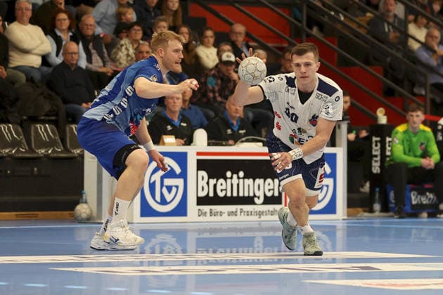 13.12.2025, Herren, Handball, Saison 2025 2026, 2. Handball-Bundesliga, 15. Spieltag: TV Grosswallstadt - 1. VfL Potsdam v.li. Patrick Gempp ( 7, TV Großwallstadt) und Marco Mengon ( 30, VfL Potsdam) Elsenfeld Untermainhalle Bayern Deutschland