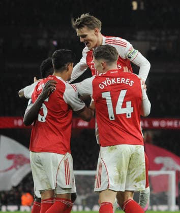 Football - 2025 2026 Premier League - Arsenal vs Weolverhampton Wanderers - Emirates Stadium - Saturday 13th December 2025. Bukayo Saka celebrates with Arsenal™s players after his cross led to the first goal 