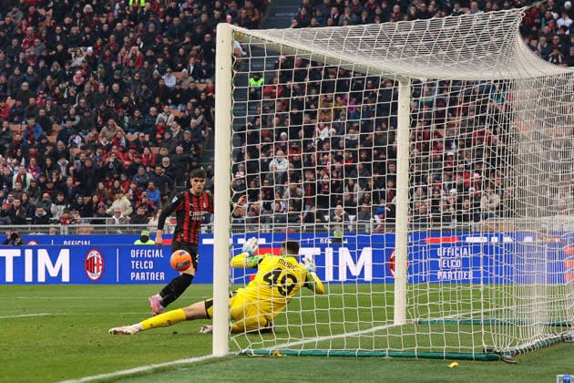 Milan, Italy, 14th December 2025. Davide Bartesaghi of AC Milan scores to level the game at 1-1 during the AC Milan vs Sassuolo Serie A match at Giuseppe Meazza, Milan. Picture credit should read: Jonathan Moscrop Sportimage EDITORIAL USE ONLY. No use with unauthorised audio, video, data, fixture lists, club league logos or live services. Online in-match use limited to 120 images, no video emulation. No use in betting, games or single club league player publications. SPI_002_JM_MILAN_SASSUOLO SPI-4363-0002