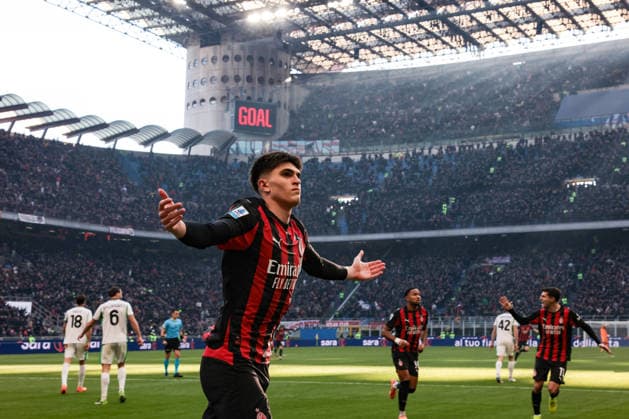 Milan, Italy, 14th December 2025. Davide Bartesaghi of AC Milan celebrates after scoring his second goal to give the hosts a 2-1 lead during the AC Milan vs Sassuolo Serie A match at Giuseppe Meazza, Milan. Picture credit should read: Jonathan Moscrop Sportimage EDITORIAL USE ONLY. No use with unauthorised audio, video, data, fixture lists, club league logos or live services. Online in-match use limited to 120 images, no video emulation. No use in betting, games or single club league player publications. SPI_018_JM_MILAN_SASSUOLO SPI-4363-0018
