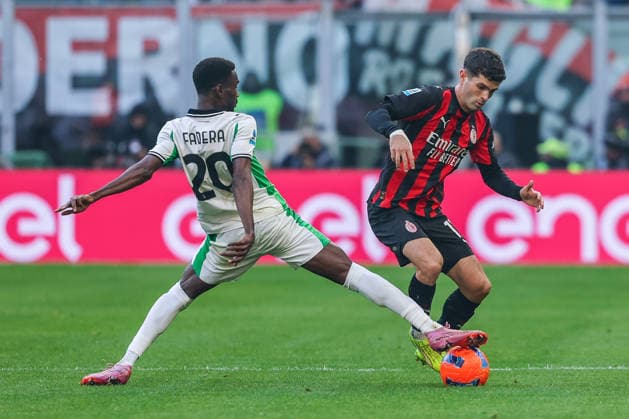 AC Milan vs US Sassuolo - Serie A 2025 26 - 14 12 2025 Christian Pulisic of AC Milan competes for the ball with Alieu Fadera of US Sassuolo during Serie A 2025 26 football match between AC Milan and US Sassuolo at San Siro Stadium in Milan Copyright: xBEAUTIFULxSPORTS Carabellix
