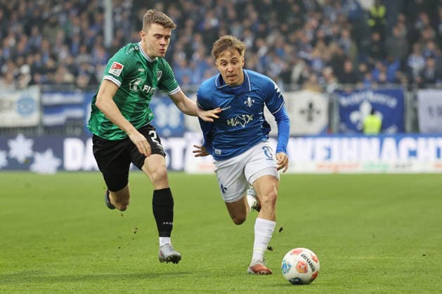 14.12.2025, xtvx, Fussball 2.Bundesliga, SV Darmstadt 98 - Preußen Münster v.l. Zweikampf, Duell, duel, tackle, compete Jano ter Horst (Preussen Muenster) Luca Marseiler (SV Darmstadt 98) (DFL DFB REGULATIONS PROHIBIT ANY USE OF PHOTOGRAPHS as IMAGE SEQUENCES and or QUASI-VIDEO) Darmstadt