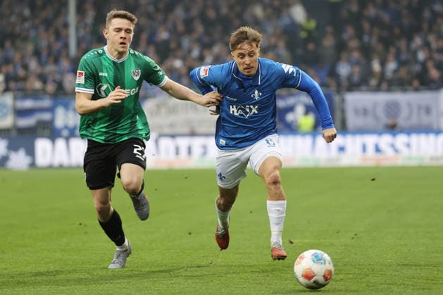 14.12.2025, xtvx, Fussball 2.Bundesliga, SV Darmstadt 98 - Preußen Münster v.l. Zweikampf, Duell, duel, tackle, compete Jano ter Horst (Preussen Muenster) Luca Marseiler (SV Darmstadt 98) (DFL DFB REGULATIONS PROHIBIT ANY USE OF PHOTOGRAPHS as IMAGE SEQUENCES and or QUASI-VIDEO) Darmstadt