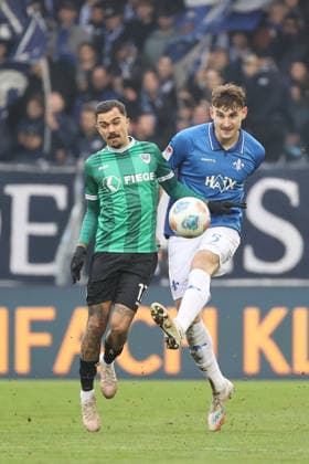 14.12.2025, xtvx, Fussball 2.Bundesliga, SV Darmstadt 98 - Preußen Münster v.l. Zweikampf, Duell, duel, tackle, compete Oliver Batista Meier (Preussen Muenster) Matej Maglica (SV Darmstadt 98) (DFL DFB REGULATIONS PROHIBIT ANY USE OF PHOTOGRAPHS as IMAGE SEQUENCES and or QUASI-VIDEO) Darmstadt