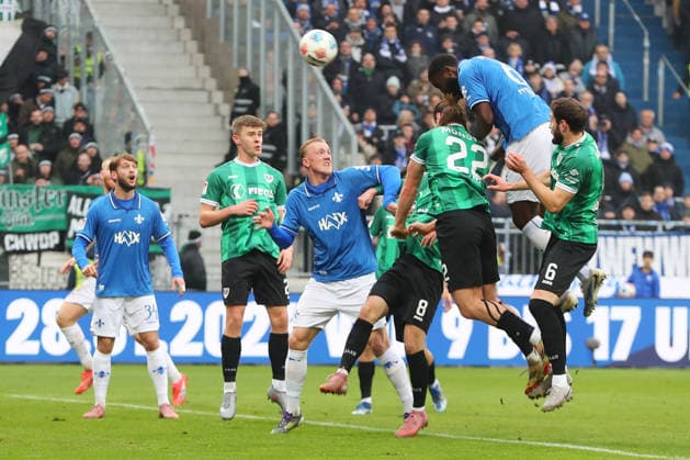 14.12.2025, xtvx, Fussball 2.Bundesliga, SV Darmstadt 98 - Preußen Münster v.l. Kopfball Patric Pfeiffer (SV Darmstadt 98) (DFL DFB REGULATIONS PROHIBIT ANY USE OF PHOTOGRAPHS as IMAGE SEQUENCES and or QUASI-VIDEO) Darmstadt
