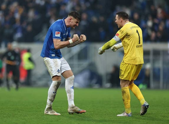 14.12.2025, Fussball 2. Bundesliga, SV Darmstadt 98 - SC Preußen Münster, emonline, emspor, despor, v.l., Matej Maglica (SV Darmstadt 98), Torwart Marcel Schuhen (SV Darmstadt 98) jubelnd bejubelt jubelt jubeln DFL DFB REGULATIONS PROHIBIT ANY USE OF PHOTOGRAPHS AS IMAGE SEQUENCES AND OR QUASI-VIDEO. xdcx