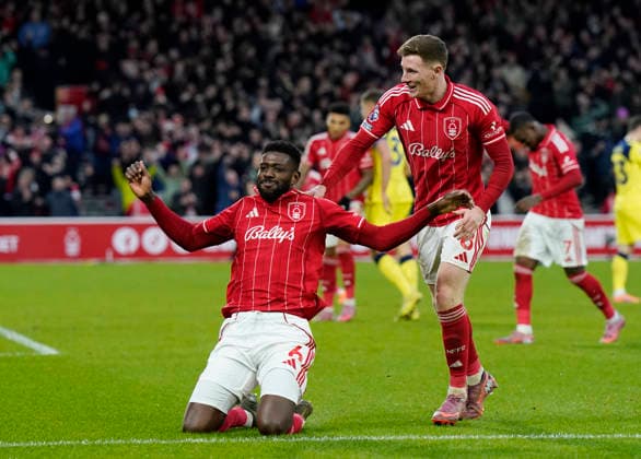 Nottingham, England, 14th December 2025. Ibrahim Sangare of Nottingham Forest celebrates scoring their third goalduring the Nottingham Forest vs Tottenham Hotspur Premier League match at the City Ground, Nottingham. Picture credit should read: Andrew Yates Sportimage EDITORIAL USE ONLY. No use with unauthorised audio, video, data, fixture lists, club league logos or live services. Online in-match use limited to 120 images, no video emulation. No use in betting, games or single club league player publications. SPI_077_AY_Forest_Spurs SPI-4376-0077