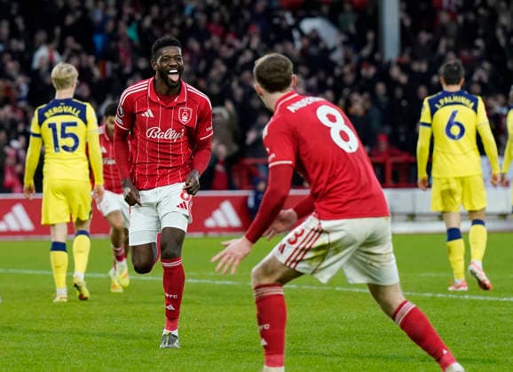 Nottingham, England, 14th December 2025. Ibrahim Sangare of Nottingham Forest celebrates scoring their third goalduring the Nottingham Forest vs Tottenham Hotspur Premier League match at the City Ground, Nottingham. Picture credit should read: Andrew Yates Sportimage EDITORIAL USE ONLY. No use with unauthorised audio, video, data, fixture lists, club league logos or live services. Online in-match use limited to 120 images, no video emulation. No use in betting, games or single club league player publications. SPI_078_AY_Forest_Spurs SPI-4376-0078