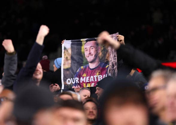 14th December 2025; London Stadium, London, England; Premier League Football, West Ham United versus Aston Villa; Aston Villa fans holding up a John McGinn of Aston Villa flag titled Our Meatball  JohnxPatrickxFletcher