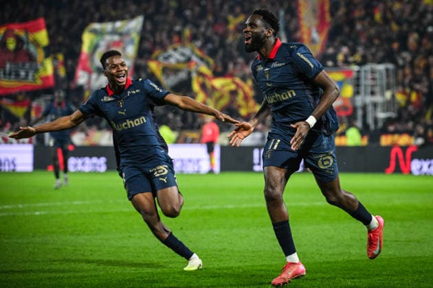 December 14, 2025, Lens, France, France: Odsonne EDOUARD of Lens celebrate his goal with Mamadou SANGARE of Lens during the Ligue 1 match between RC Lens and OGC Nice at Bollaert-Delelis Stadium on December 14, 2025 in Lens, France. Lens France - ZUMAm308 20251214_zsp_m308_008 Copyright: xMatthieuxMirvillex