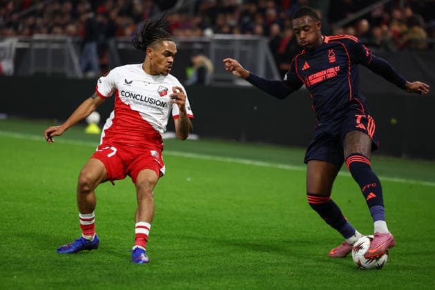 Utrecht, Netherlands, 11th December 2025. Alonzo Engwanda of FC Utrecht and Callum Hudson-Odoi of Nottingham Forest challenge for the ball during the FC Utrecht vs Nottingham Forest UEFA Europa League match at Stadion Galgenwaard, Utrecht. Picture credit should read: Paul Terry Sportimage EDITORIAL USE ONLY. No use with unauthorised audio, video, data, fixture lists, club league logos or live services. Online in-match use limited to 120 images, no video emulation. No use in betting, games or single club league player publications. SPI_126_PT_Utrecht_Notts_Forest_ SPI-4361-0126