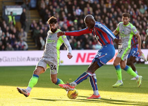London, England, 14th December 2025. Jean Philippe Matate of Crystal Palace fires in a shot during the Crystal Palace vs Manchester City Premier League match at Selhurst Park, London. Picture credit should read: David Klein Sportimage EDITORIAL USE ONLY. No use with unauthorised audio, video, data, fixture lists, club league logos or live services. Online in-match use limited to 120 images, no video emulation. No use in betting, games or single club league player publications. SPI_DK_012_Crystal_Palace_Man_City SPI-4377-0012