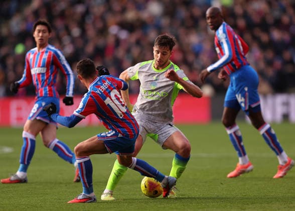 London, England, 14th December 2025. Nico Gonzalez of Manchester City during the Crystal Palace vs Manchester City Premier League match at Selhurst Park, London. Picture credit should read: David Klein Sportimage EDITORIAL USE ONLY. No use with unauthorised audio, video, data, fixture lists, club league logos or live services. Online in-match use limited to 120 images, no video emulation. No use in betting, games or single club league player publications. SPI_DK_082_Crystal_Palace_Man_City SPI-4377-0082