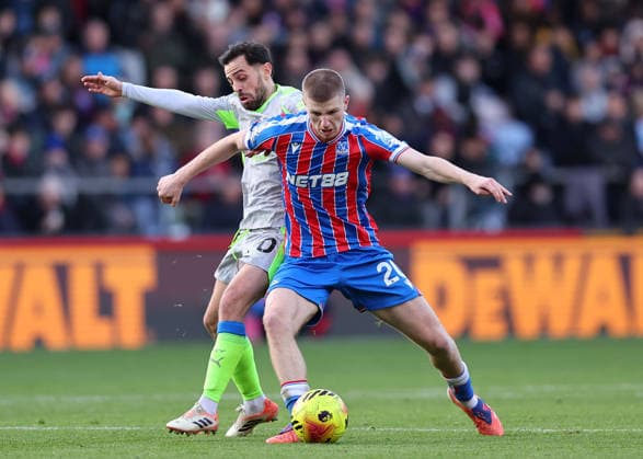 London, England, 14th December 2025. Adam Wharton of Crystal Palace with Bernardo Silva of Manchester City during the Crystal Palace vs Manchester City Premier League match at Selhurst Park, London. Picture credit should read: David Klein Sportimage EDITORIAL USE ONLY. No use with unauthorised audio, video, data, fixture lists, club league logos or live services. Online in-match use limited to 120 images, no video emulation. No use in betting, games or single club league player publications. SPI_DK_087_Crystal_Palace_Man_City SPI-4377-0087