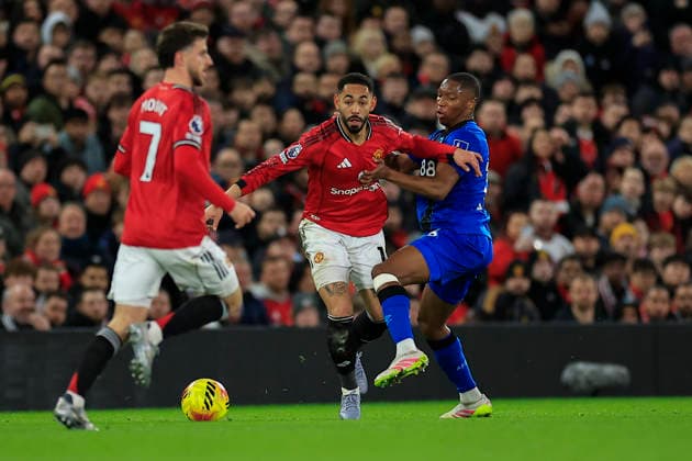 Manchester United, ManU v Bournemouth Premier League 15 12 2025. Matheus Cunha (10) of Manchester United is challenged by Bafode Diakite (18) of Bournemouth during the Premier League match between Manchester United and Bournemouth at Old Trafford, Manchester, England on 15 December 2025. Manchester Old Trafford Greater Manchester England Editorial use only DataCo restrictions apply See www.football-dataco.com , Copyright: xConorxMolloyx PSI-23424-0040