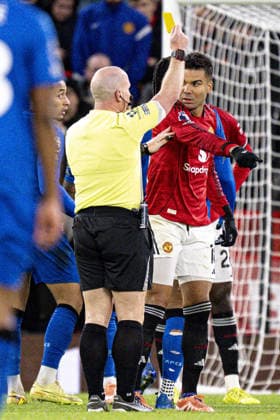 MANCHESTER - DECEMBER 15: Casemiro of Manchester United, ManU shown yellow card by referee Simon Hooper during the Premier League 2025 match between Manchester United and Bournemouth at Old Trafford, in Manchester, England. Photo: Will Palmer Sports Press Photo Copyright: xWillxPalmer SportsxPressxPhotox Sportspressphoto_SPR74338